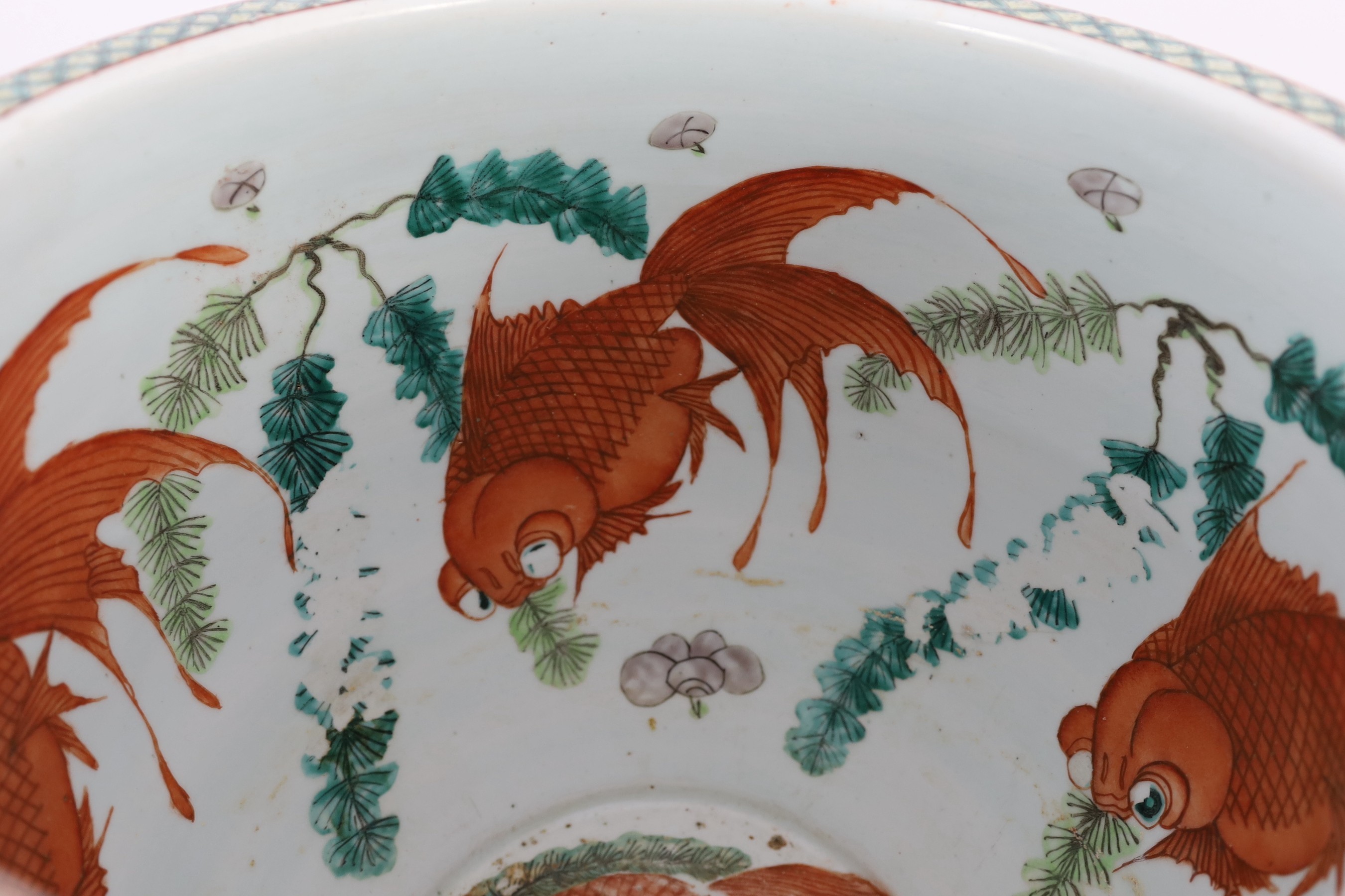 A Chinese enamelled porcelain goldfish bowl, late 19th century, 42cm diameter 35cm high, several short hairline cracks to the body